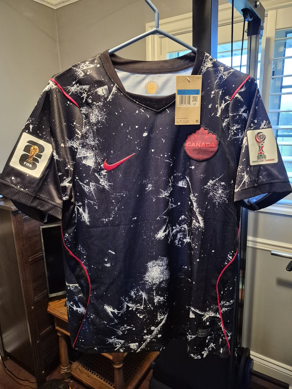 Nike Black Top with Red Swoosh and White Splatter - WORLD CUP FIFA 2026